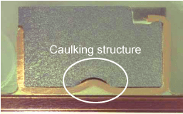 Caulking structure